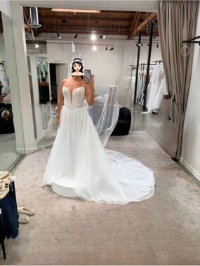 Strapless Corset Bodice White Bridal Gown with Flowing Train